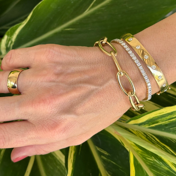 Bold Gold Seven Diamond Bangle